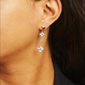 A PAIR OF 18K GOLD, BLUE TOPAZ AND TSAVORITE GARNET